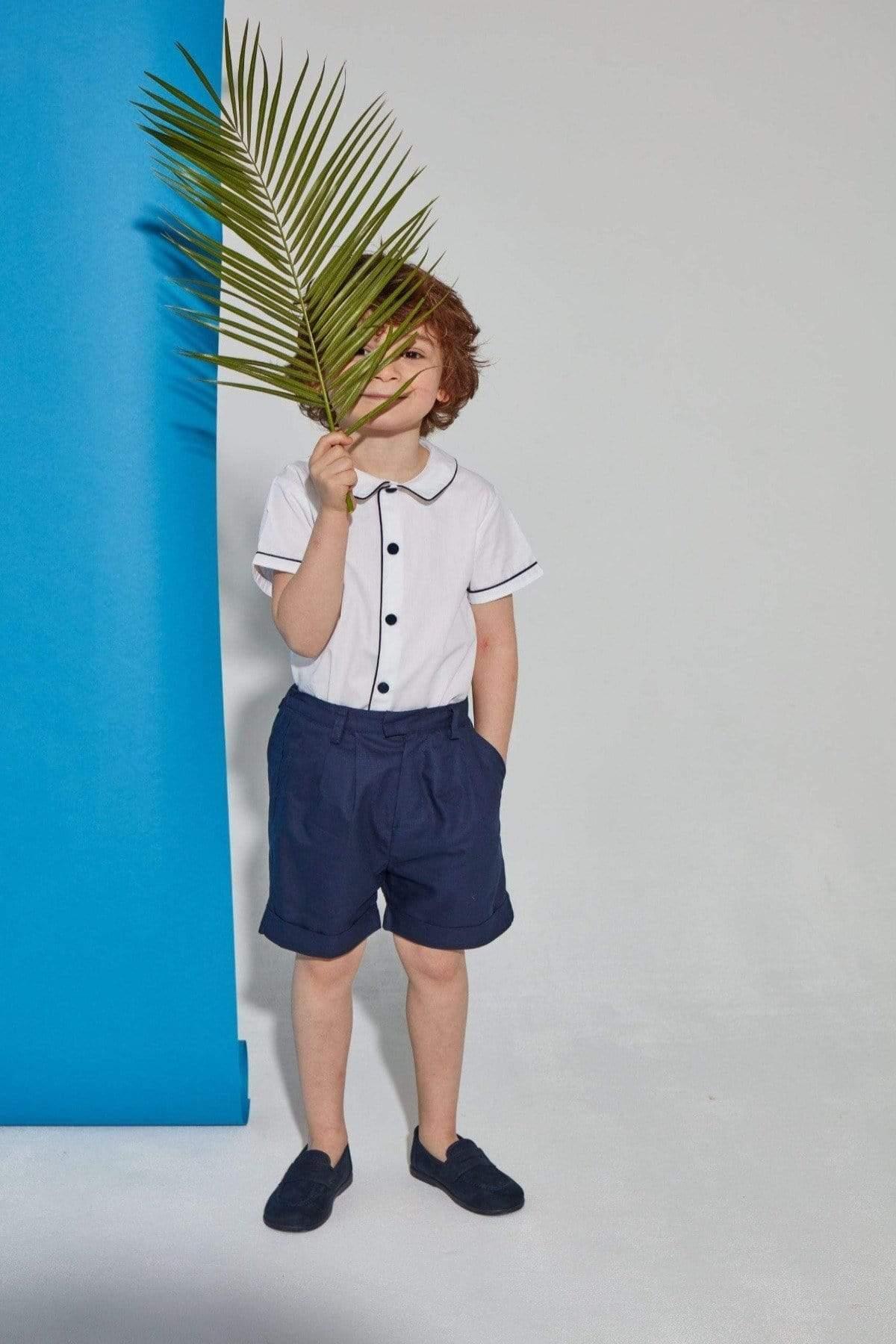 Adam, boy short with rolled up bottom, in Navy cotton poplin