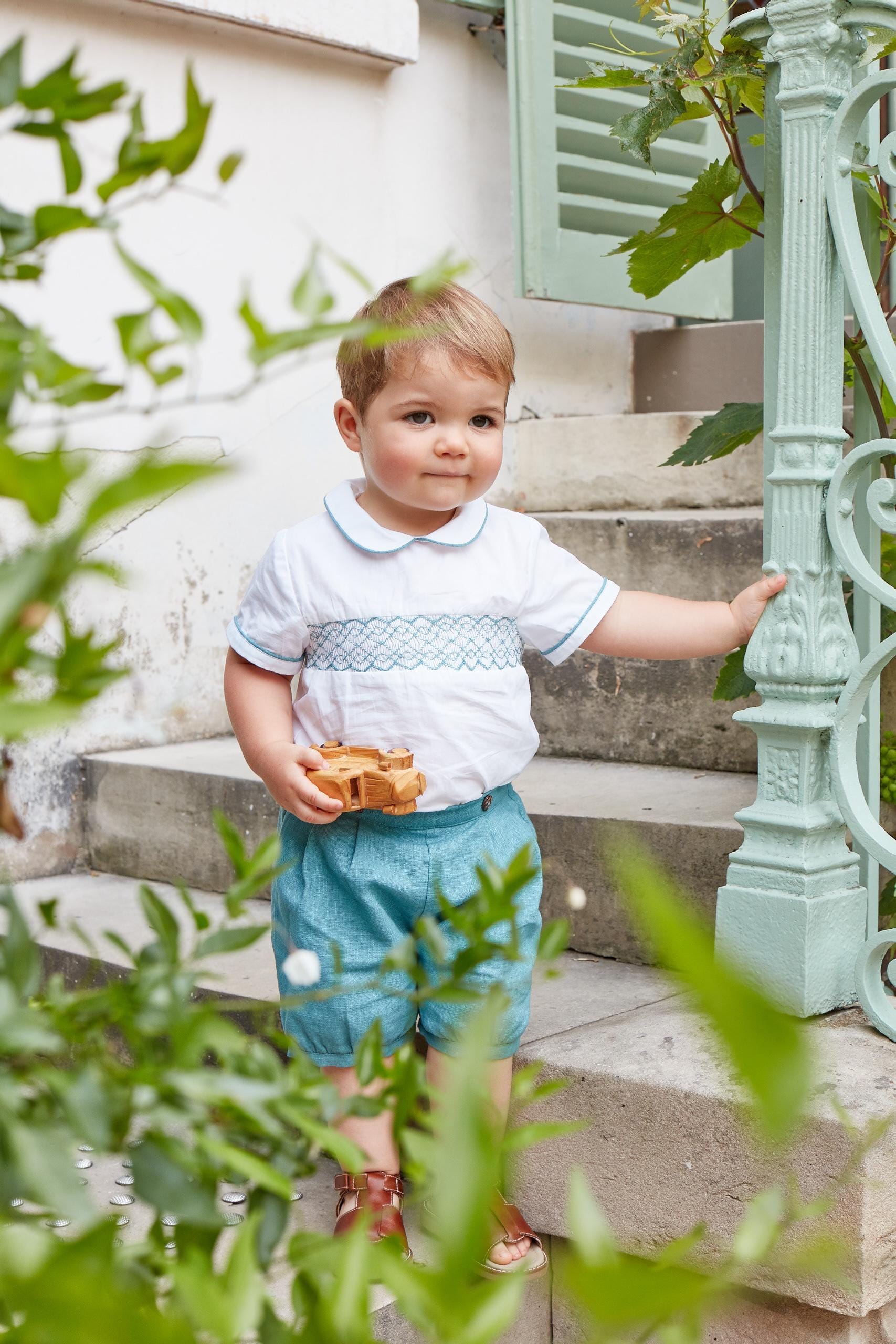 Barnabé, baby boy set made up of a white smocked shirt with peterpan collar and a bloomer, in Teal Linen