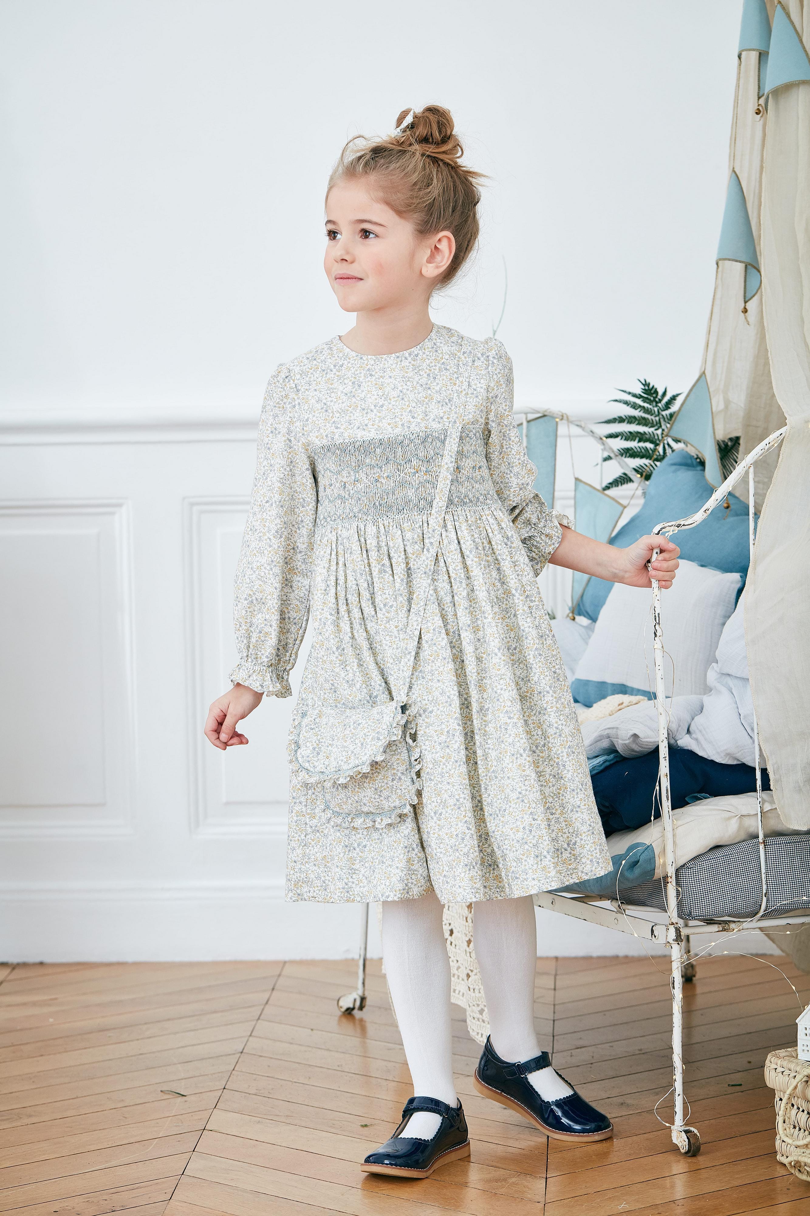 Harchel, Robe à manches longues, encolure ronde, taille smockée, en imprimé fleuri bleu ciel/moutarde - Harchel, Long-sleeved dress, round neckline, smocked waist, in Sky blue/mustard floral print