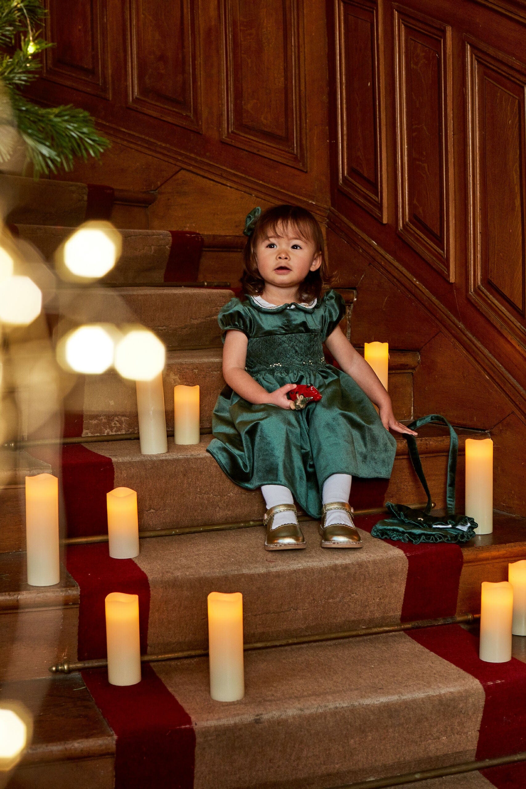 Héloïse, robe à smocks en velours vert émeraude