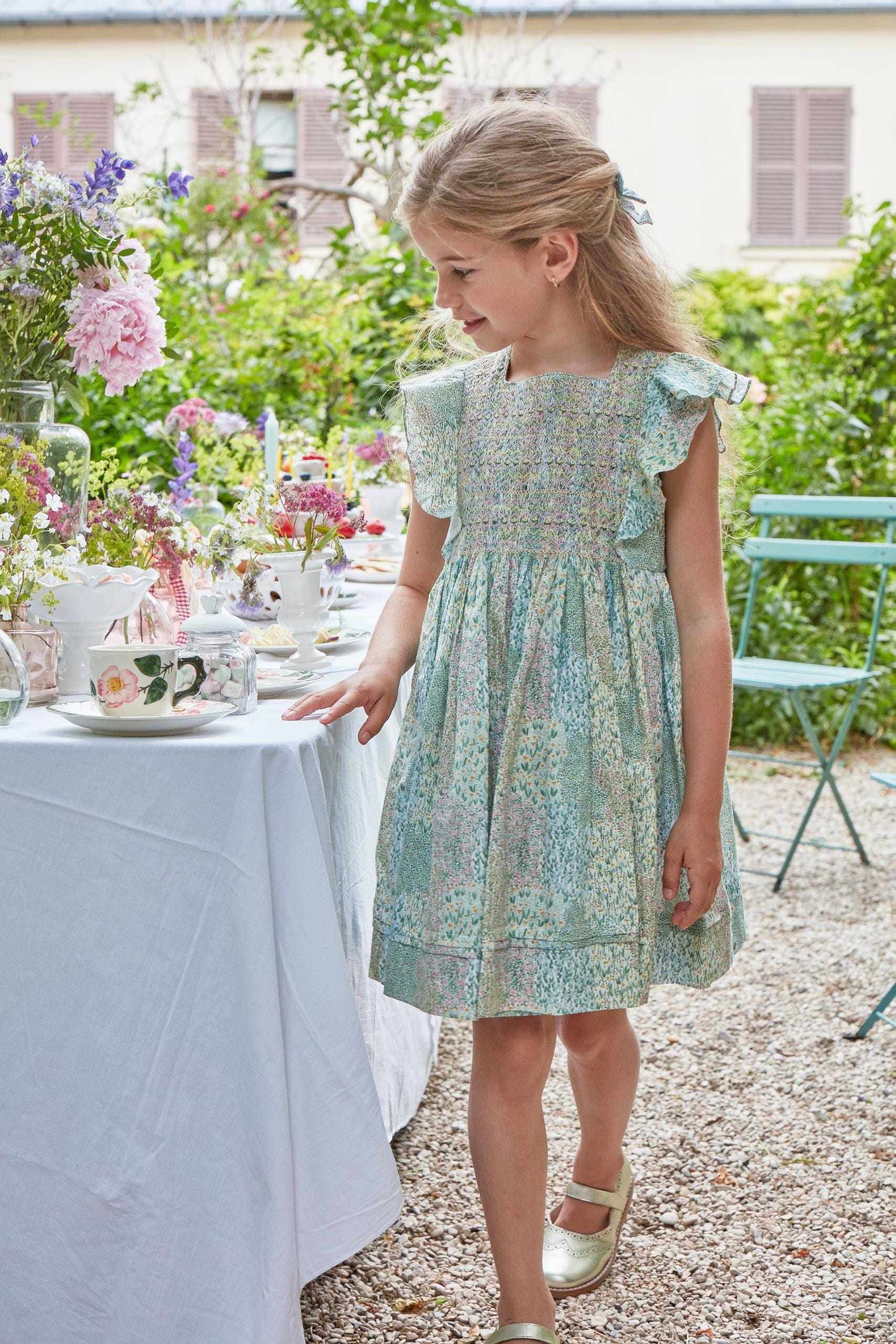 Léanne, smocked dress with ruffled sleeves and square neckline, in Flowery meadow Print