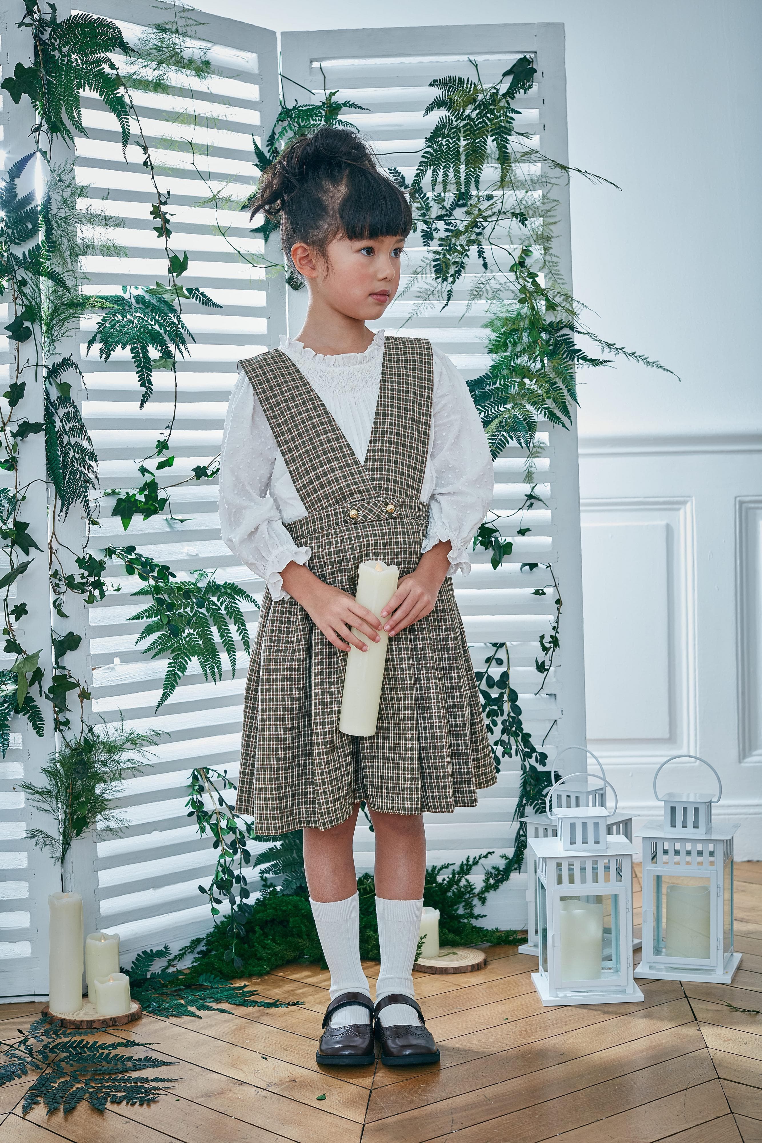 Mayeule, Jupe plissée réversible à bretelles, encolure cache-cœur ou ronde, en tartan kaki - Mayeule, Reversible pleated skirt with straps, wrap-around or round neckline, in Khaki tartan